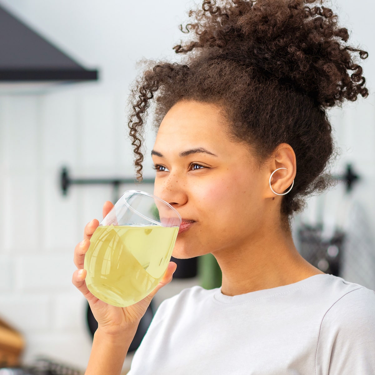 Image of a person drinking the product