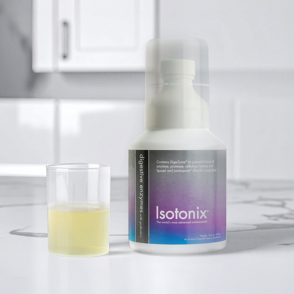image of product beside water and powder in mixed overcap