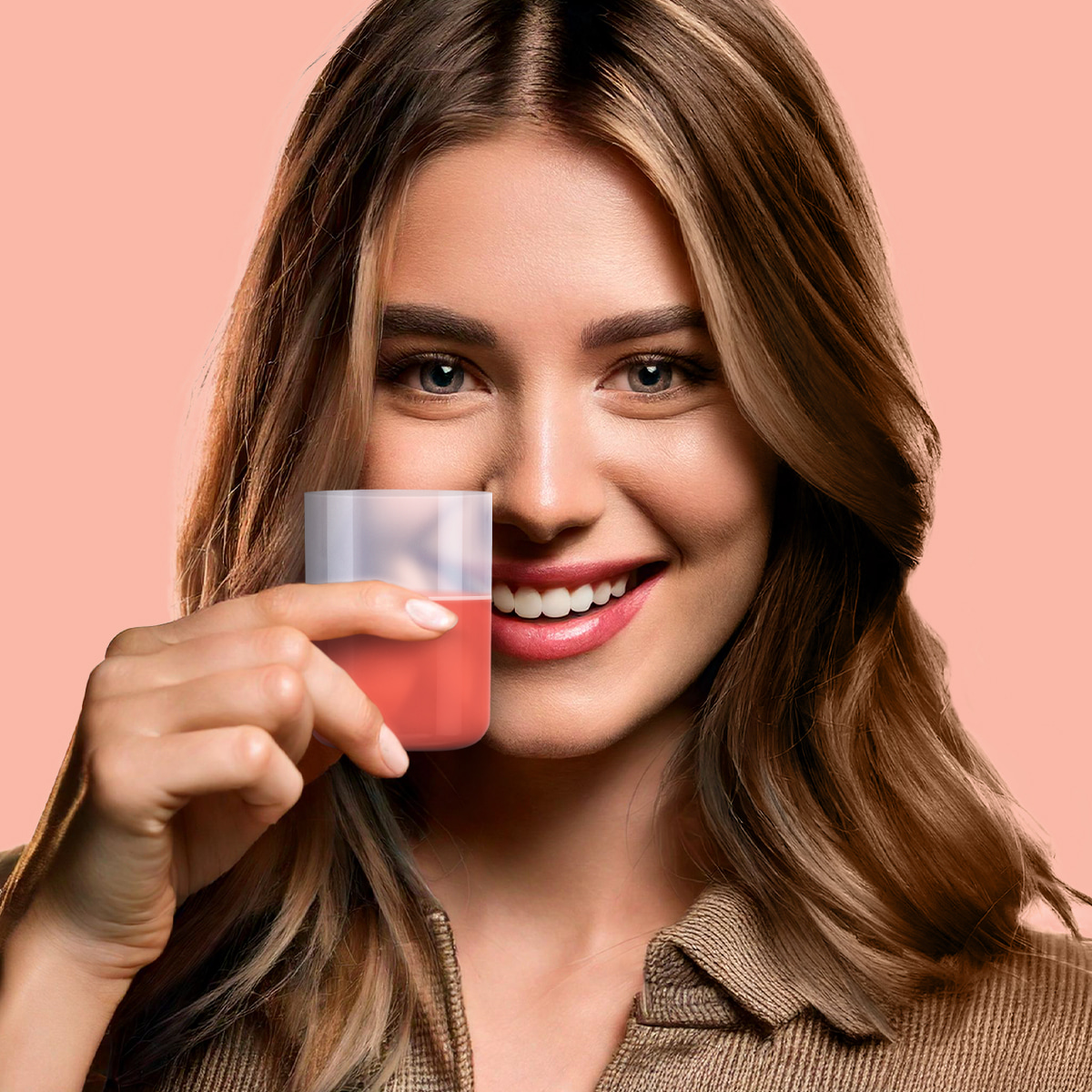 image of woman drinking mixed product