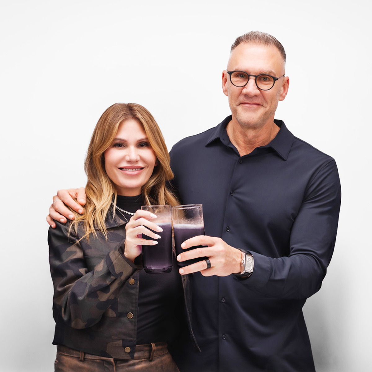 image of Loren and Gary with glasses of the Ultimate Isotonix Protocol