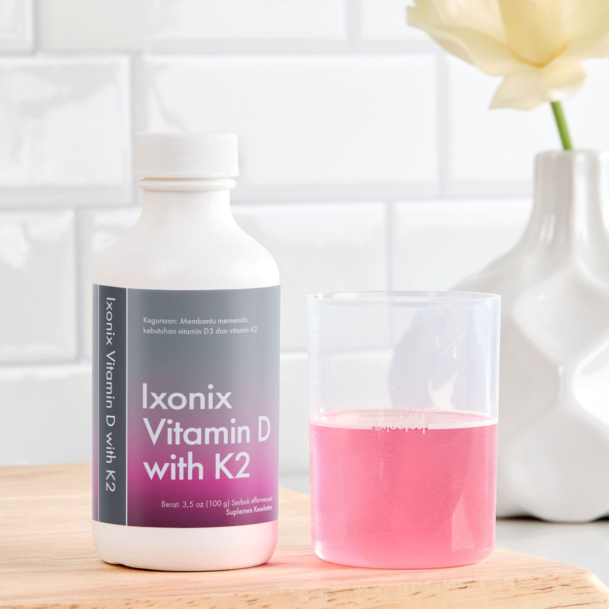 image of mixed product in overcap beside bottle