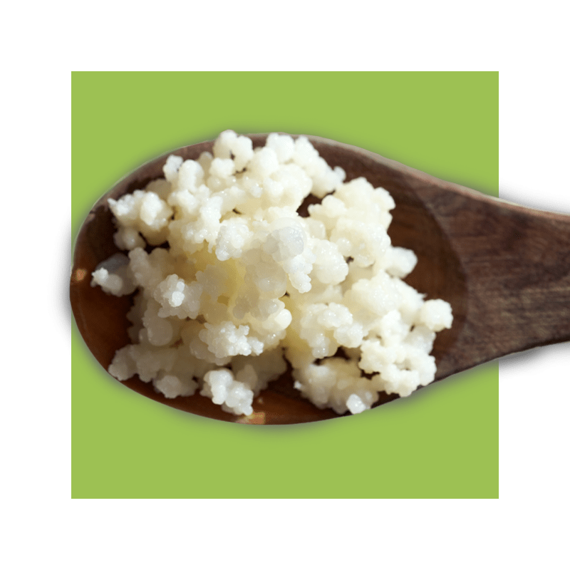 image of a spoon with cheese on it