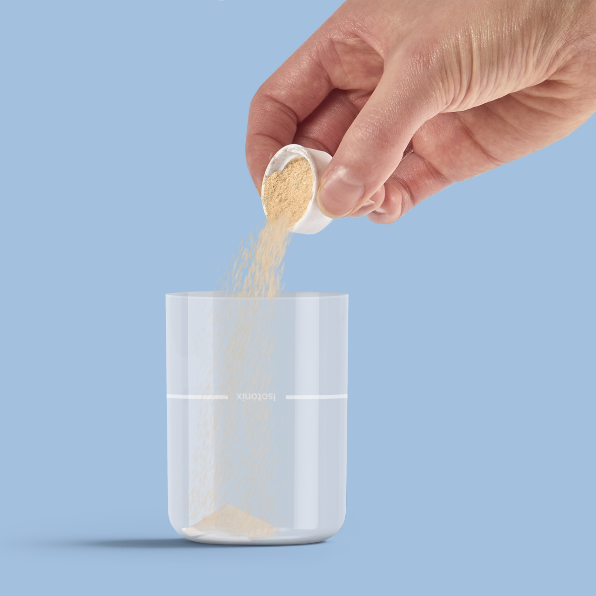 image of powder being poured into overcap