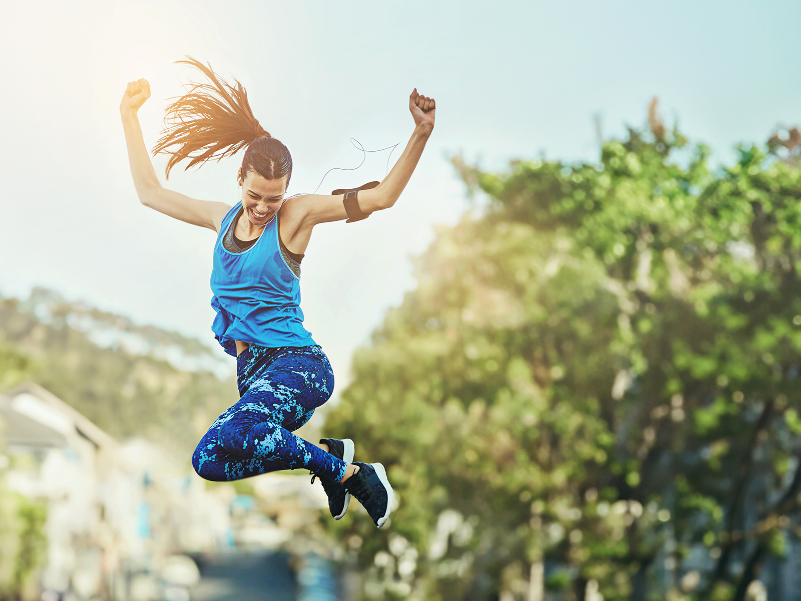 image of person jumping with joy