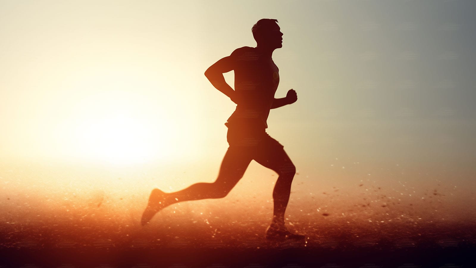 image of man running in sunshine